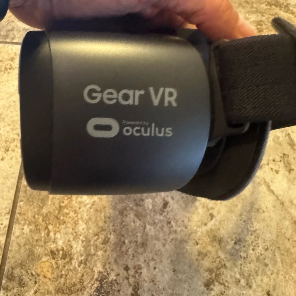Black VR Headset Samsung Gear VR, a virtual reality headset only. No remote.